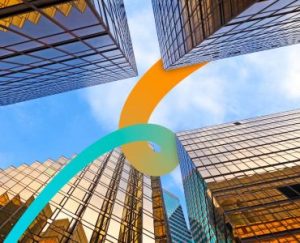 a group of tall buildings with a sky background