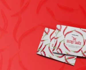 two business cards on a red background