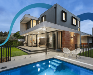 a house with a swimming pool in front of it