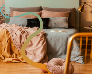 a bedroom with a bed and a chair