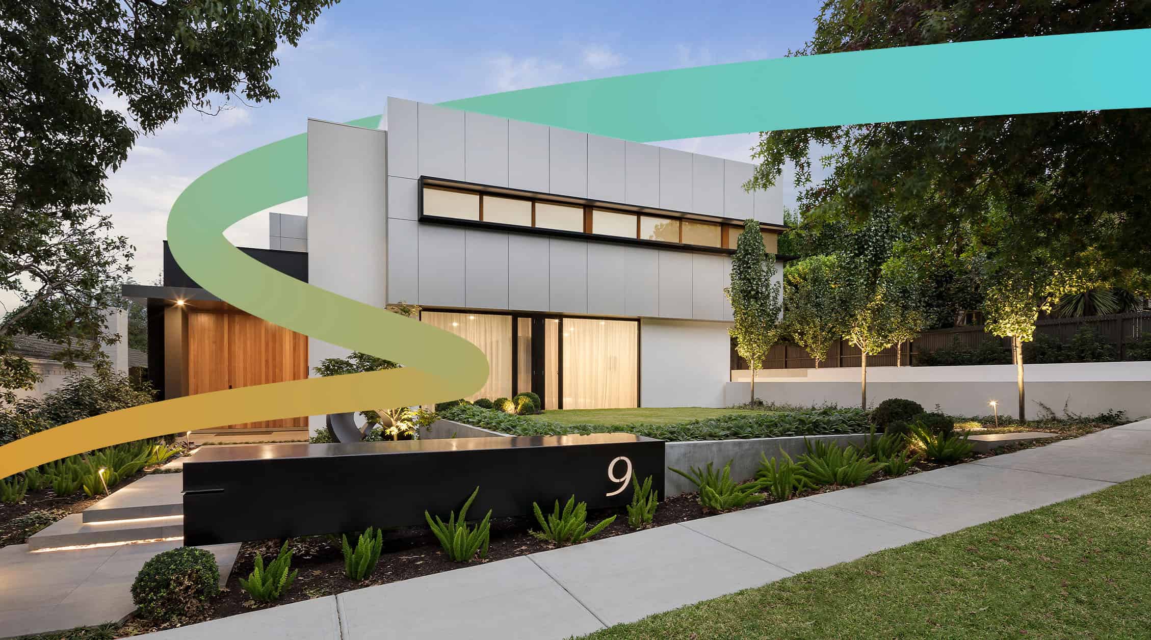 a modern house with a curved front yard